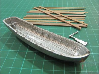 Chalupa de madera y metal